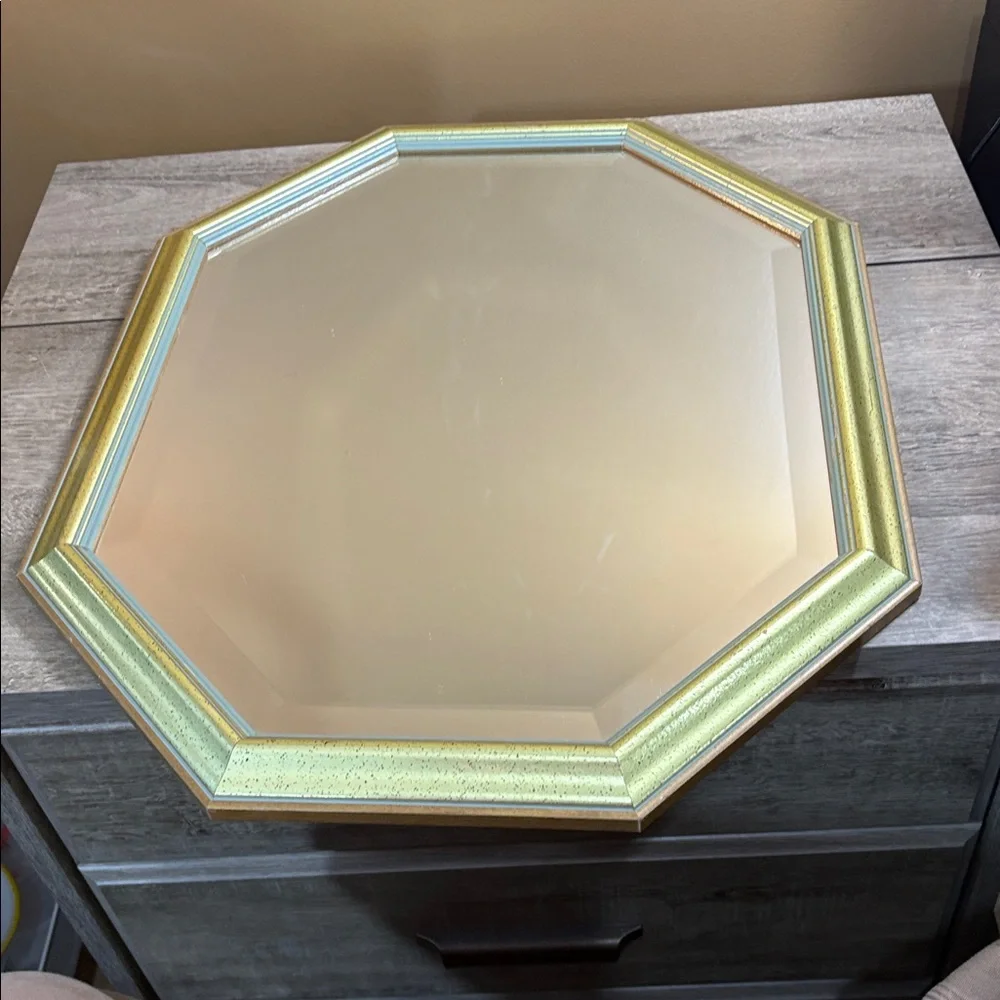 A mid century modern style octagonal mirror vertical or horizontal orientation